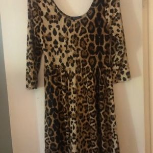 Stunning leopard print ,soft material, like new